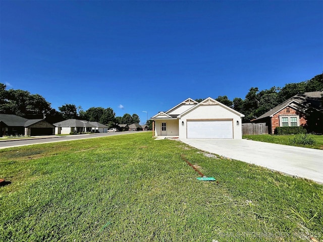 2005 N Alora Ave, Tahlequah, OK 74464 - view of front of home featuring driveway and a garage