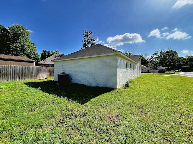 2005 N Alora Ave, Tahlequah, OK 74464 - view of property exterior featuring a central AC unit and brick siding