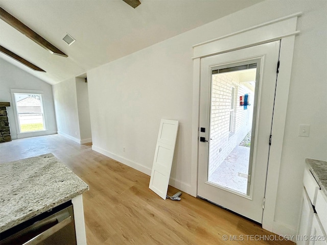 2005 N Alora Ave, Tahlequah, OK 74464 - unfurnished dining area with light wood-style floors and baseboards