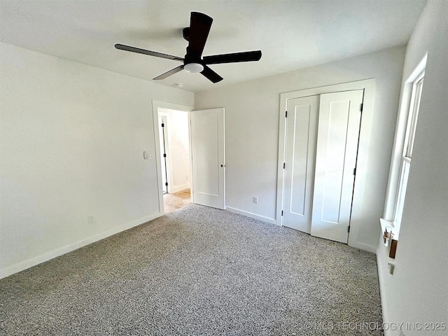 2005 N Alora Ave, Tahlequah, OK 74464 - unfurnished bedroom featuring carpet floors, ceiling fan, and a closet