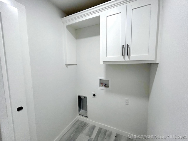 2005 N Alora Ave, Tahlequah, OK 74464 - washroom with cabinet space, hookup for an electric dryer, hookup for a washing machine, and light wood-type flooring