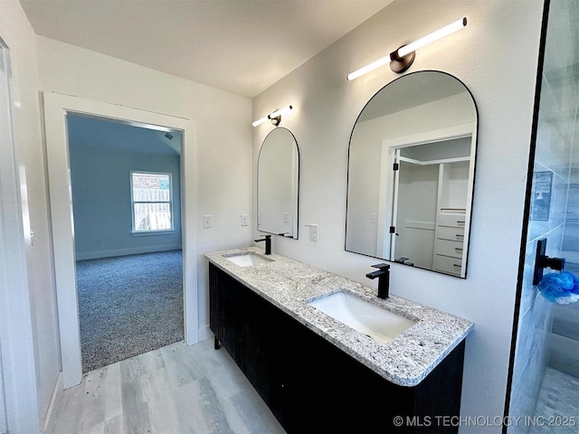 2005 N Alora Ave, Tahlequah, OK 74464 - full bath featuring wood finished floors and double vanity