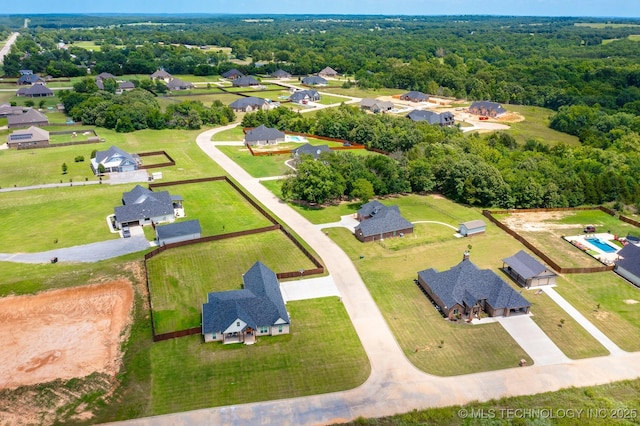 12349 County Road 3571, Ada, OK 74820 - aerial view of residential area featuring a forest