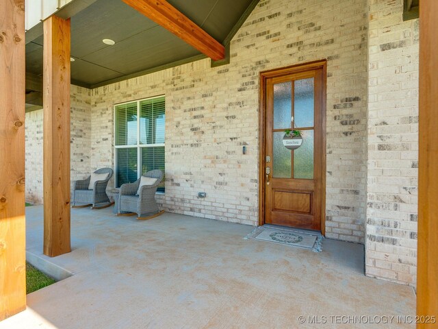12349 County Road 3571, Ada, OK 74820 - doorway to property featuring brick siding