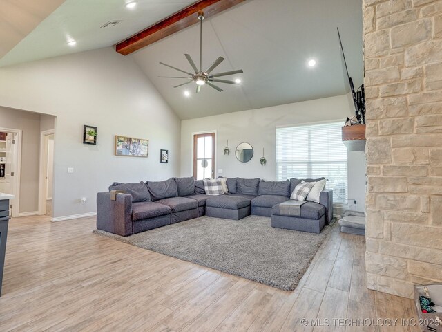 12349 County Road 3571, Ada, OK 74820 - living room with high vaulted ceiling, a ceiling fan, beam ceiling, and light wood-type flooring