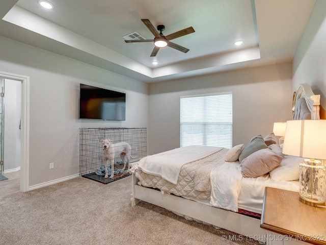 12349 County Road 3571, Ada, OK 74820 - carpeted bedroom featuring a tray ceiling, recessed lighting, and ceiling fan