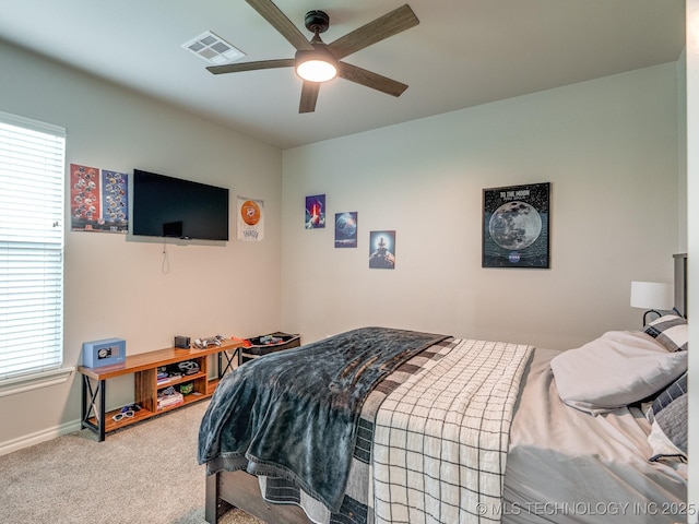 12349 County Road 3571, Ada, OK 74820 - bedroom with carpet flooring, multiple windows, and ceiling fan