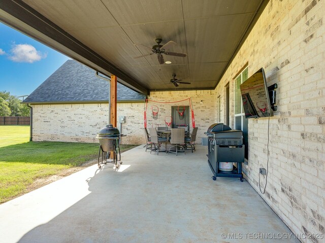 12349 County Road 3571, Ada, OK 74820 - view of patio / terrace with outdoor dining area, a ceiling fan, and area for grilling