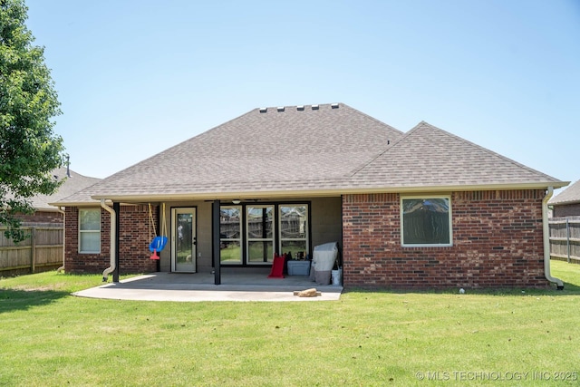 12901 N 124th E Pl, Collinsville, OK 74021 - rear view of property featuring roof with shingles, a patio area, and brick siding