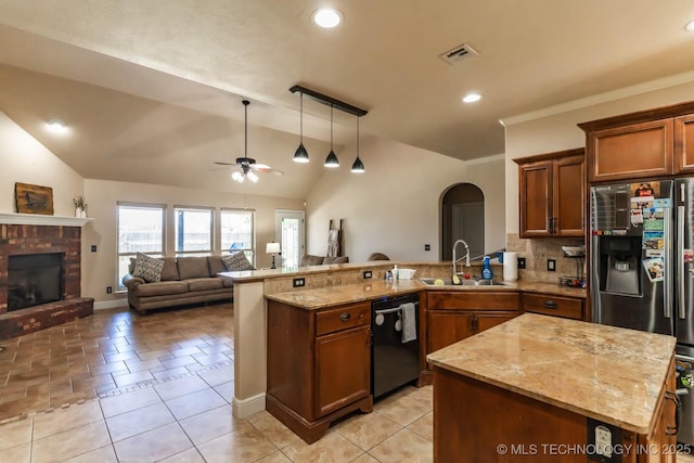12901 N 124th E Pl, Collinsville, OK 74021 - kitchen with dishwashing machine, a peninsula, refrigerator with ice dispenser, ceiling fan, and light stone counters