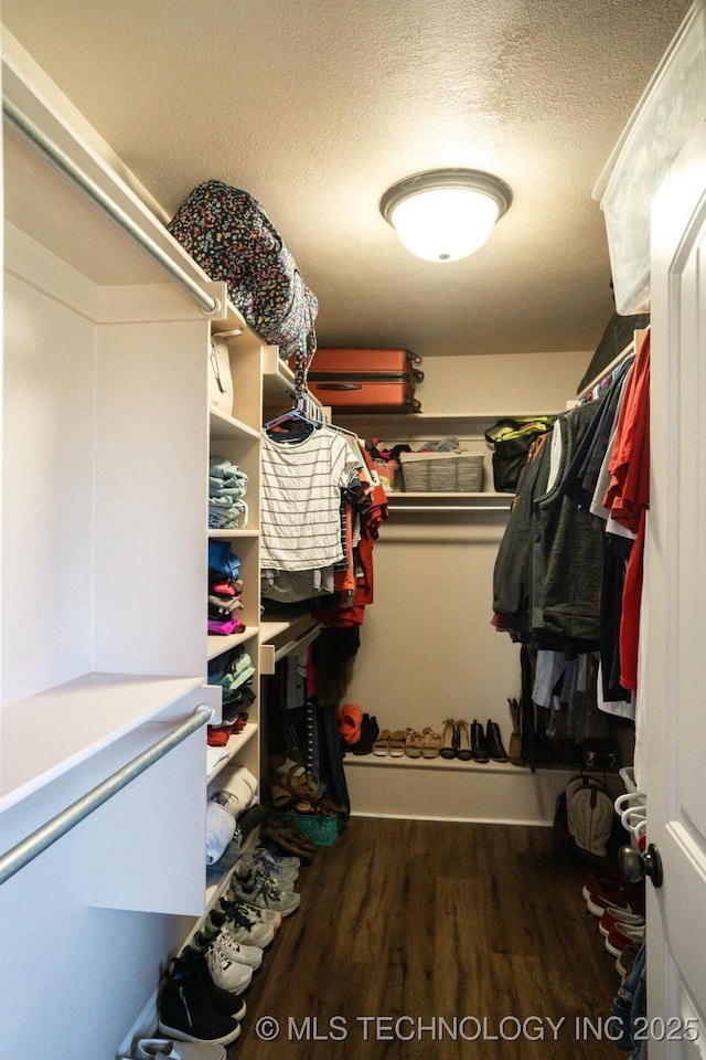 12901 N 124th E Pl, Collinsville, OK 74021 - walk in closet featuring wood finished floors