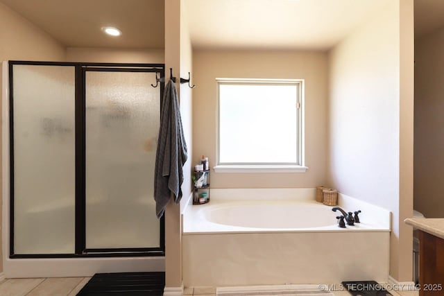 12901 N 124th E Pl, Collinsville, OK 74021 - bathroom featuring vanity, a shower stall, a bath, tile patterned floors, and recessed lighting