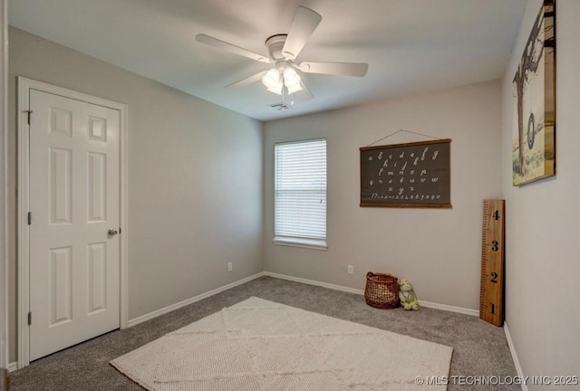 11001 N 146th E Ave, Owasso, OK 74055 - carpeted empty room featuring a ceiling fan and baseboards