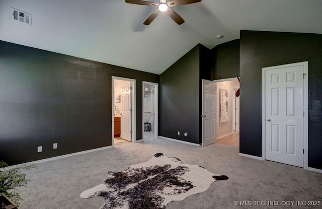 11001 N 146th E Ave, Owasso, OK 74055 - carpeted bedroom featuring connected bathroom, a ceiling fan, and high vaulted ceiling