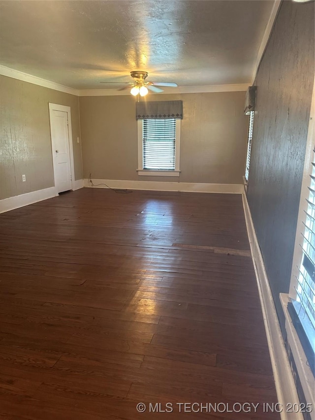 512 W Franklin, Haskell, OK 74436 - empty room featuring ceiling fan, ornamental molding, and dark wood-type flooring