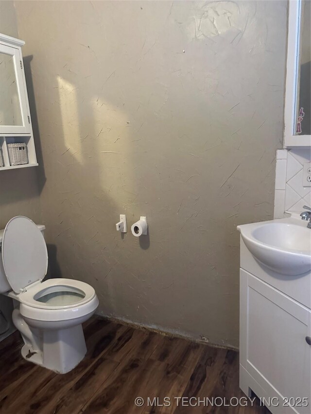512 W Franklin, Haskell, OK 74436 - half bath with wood finished floors and vanity