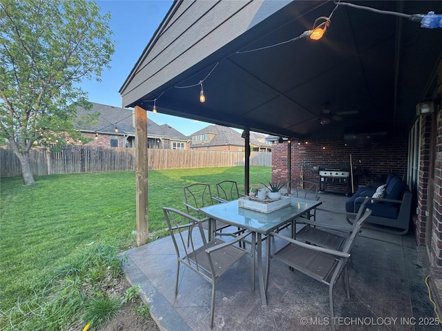 11725 S Vine Pl S, Jenks, OK 74037 - fenced backyard featuring outdoor dining space, ceiling fan, a patio area, and area for grilling