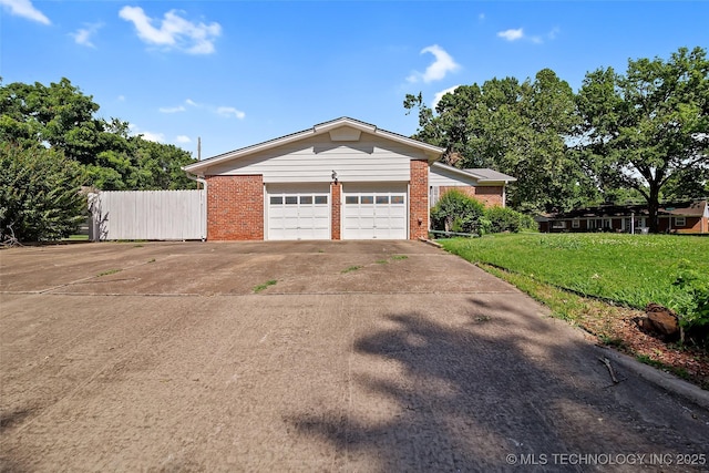 5153 S Marion Ave, Tulsa, OK 74135 - garage featuring driveway