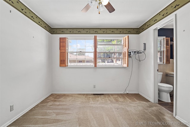 5153 S Marion Ave, Tulsa, OK 74135 - unfurnished bedroom featuring light colored carpet and ensuite bathroom