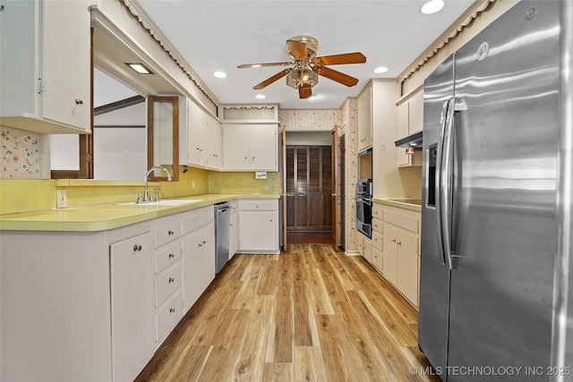 5153 S Marion Ave, Tulsa, OK 74135 - kitchen featuring appliances with stainless steel finishes, a ceiling fan, light countertops, white cabinetry, and recessed lighting