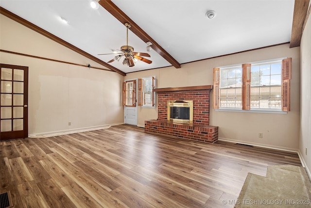 5153 S Marion Ave, Tulsa, OK 74135 - unfurnished living room with wood finished floors, a ceiling fan, and a fireplace