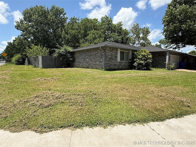 3024 S Ash Ct, Broken Arrow, OK 74012 - view of side of home with a garage and brick siding