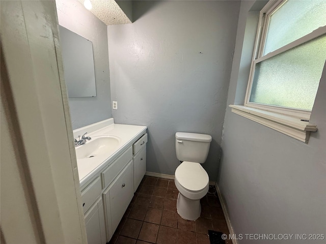 3024 S Ash Ct, Broken Arrow, OK 74012 - half bath featuring vanity and tile patterned floors