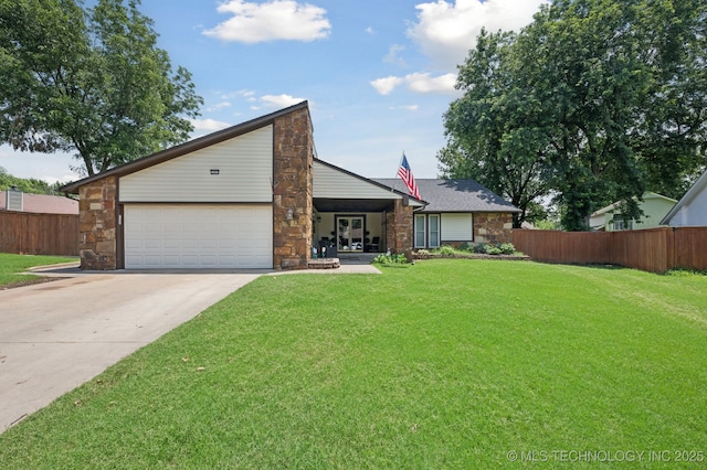 2807 W Atlanta Pl, Broken Arrow, OK 74012 - mid-century inspired home with driveway, stone siding, and a garage
