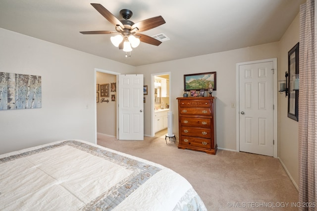 2807 W Atlanta Pl, Broken Arrow, OK 74012 - bedroom with light colored carpet, connected bathroom, and ceiling fan