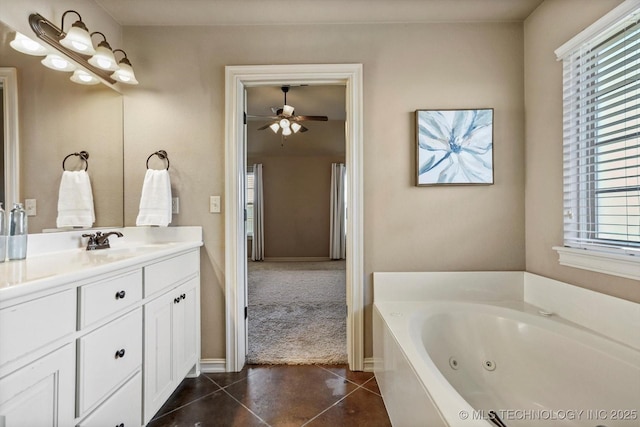 1854 E 137th Pl, Glenpool, OK 74033 - full bath featuring vanity, a jetted tub, a ceiling fan, and tile patterned floors