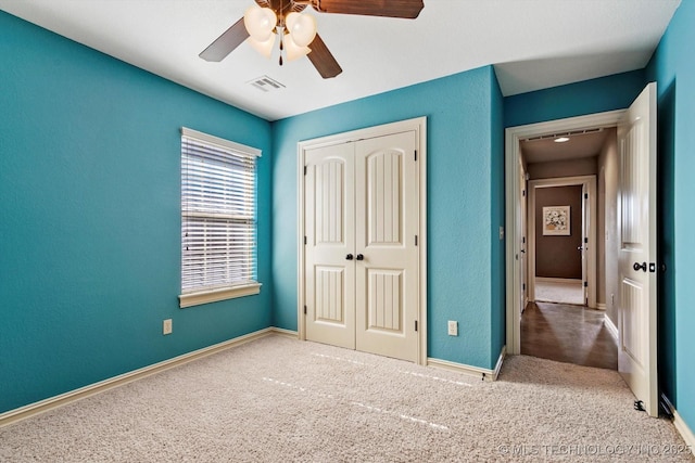 1854 E 137th Pl, Glenpool, OK 74033 - unfurnished bedroom with a closet, carpet, and a ceiling fan