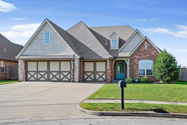 1854 E 137th Pl, Glenpool, OK 74033 - view of front of home with brick siding, concrete driveway, an attached garage, and a shingled roof