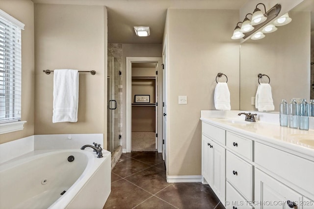 1854 E 137th Pl, Glenpool, OK 74033 - bathroom featuring a stall shower, double vanity, a jetted tub, and tile patterned floors