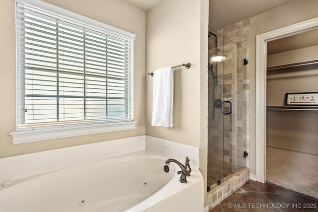 1854 E 137th Pl, Glenpool, OK 74033 - full bathroom featuring a jetted tub, a stall shower, and healthy amount of natural light