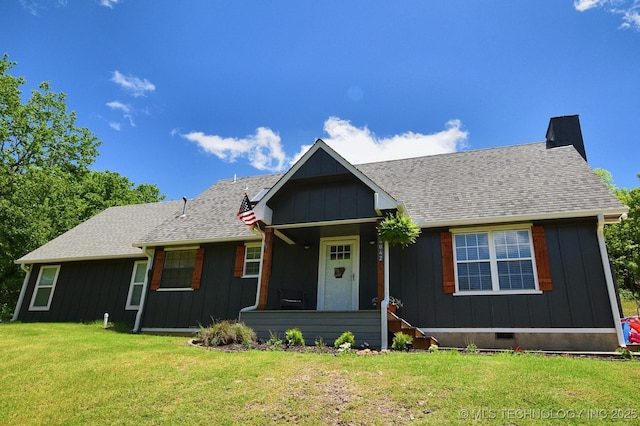 24042 S Black Valley Rd, Tahlequah, OK 74464 - view of front facade featuring a front yard, roof with shingles, and board and batten siding