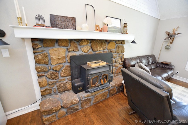 24042 S Black Valley Rd, Tahlequah, OK 74464 - living room featuring wood finished floors and a wood stove