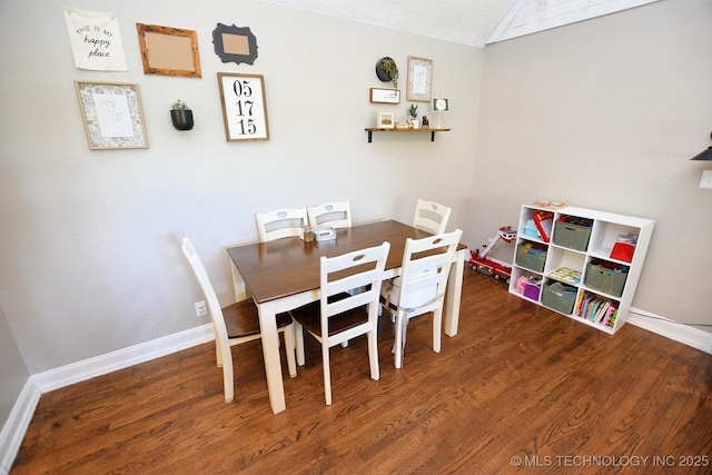 24042 S Black Valley Rd, Tahlequah, OK 74464 - dining area featuring wood finished floors and lofted ceiling