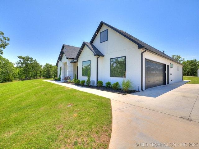 11446 Mary Knox Dr, Beggs, OK 74421 - modern farmhouse with concrete driveway, a garage, a front yard, and stucco siding