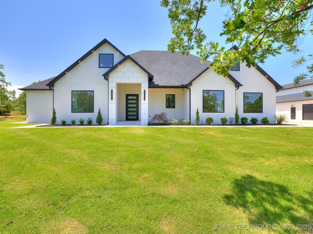 11446 Mary Knox Dr, Beggs, OK 74421 - modern inspired farmhouse featuring a front lawn and a shingled roof