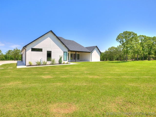 11446 Mary Knox Dr, Beggs, OK 74421 - back of house with a yard