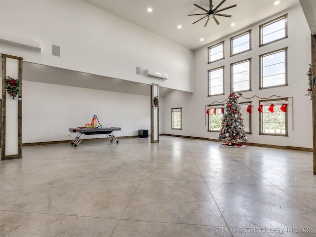 11446 Mary Knox Dr, Beggs, OK 74421 - garage with recessed lighting, a ceiling fan, and a wall mounted AC