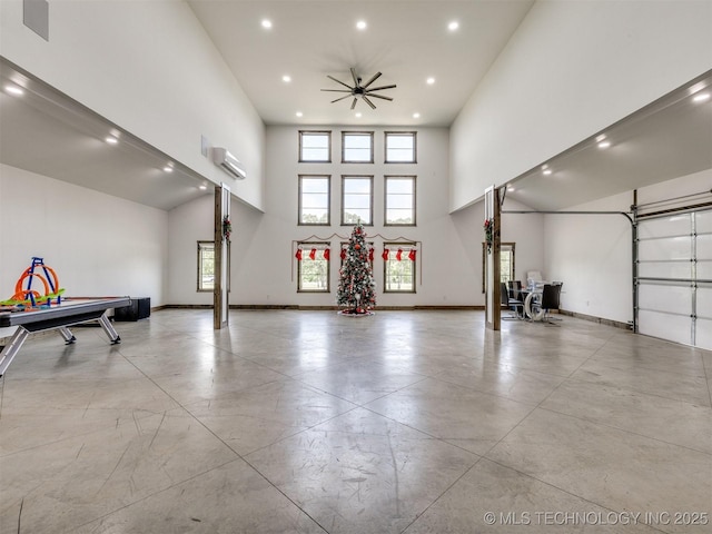 11446 Mary Knox Dr, Beggs, OK 74421 - garage with recessed lighting and a wall mounted air conditioner