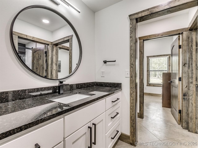 11446 Mary Knox Dr, Beggs, OK 74421 - bathroom with vanity and baseboards
