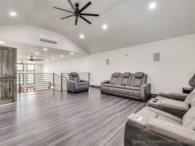 11446 Mary Knox Dr, Beggs, OK 74421 - living area featuring a ceiling fan, recessed lighting, lofted ceiling, a wall mounted AC, and wood finished floors