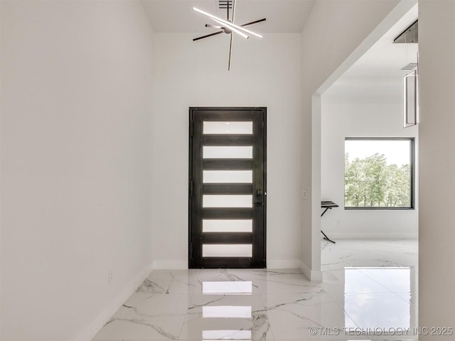 11446 Mary Knox Dr, Beggs, OK 74421 - entrance foyer featuring light marble finish flooring and baseboards