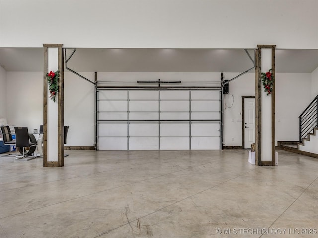 11446 Mary Knox Dr, Beggs, OK 74421 - garage featuring baseboards