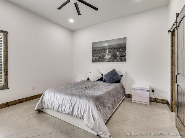 11446 Mary Knox Dr, Beggs, OK 74421 - bedroom with a barn door, recessed lighting, and a ceiling fan
