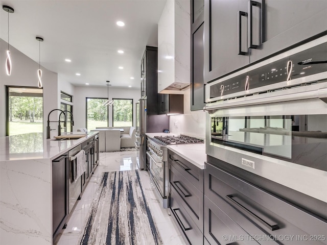 11446 Mary Knox Dr, Beggs, OK 74421 - kitchen with appliances with stainless steel finishes, light marble finish floors, recessed lighting, pendant lighting, and light stone countertops