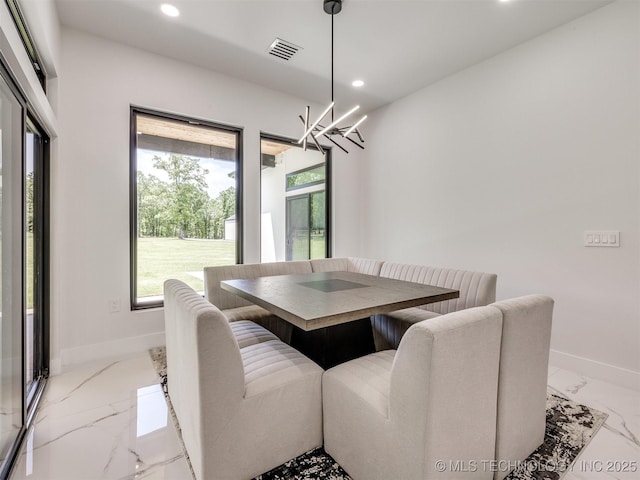 11446 Mary Knox Dr, Beggs, OK 74421 - dining area with recessed lighting, a chandelier, and marble tiled floors