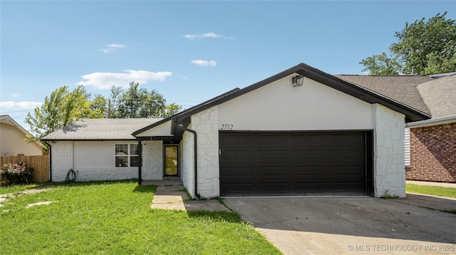 2712 S Fir Ave, Broken Arrow, OK 74012 - ranch-style home with stone siding, roof with shingles, and a garage